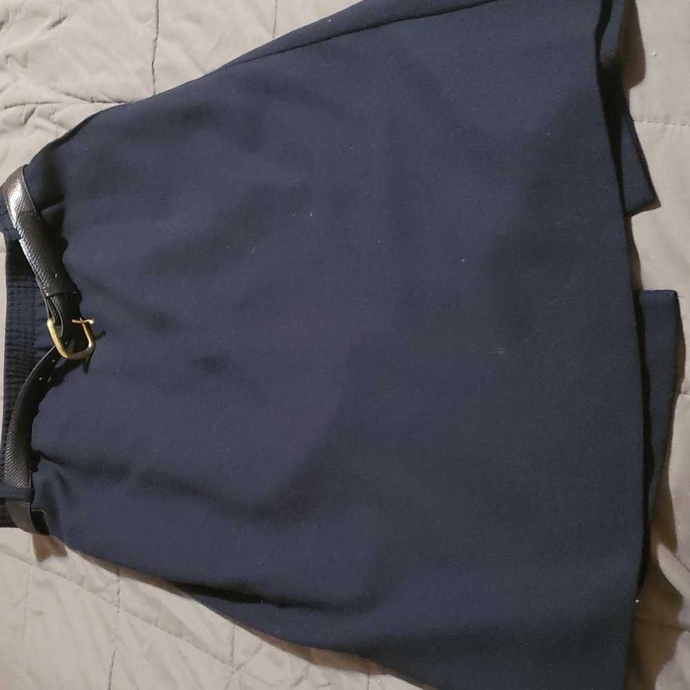 NAVY BLUE  lined  skirt size 10 Petite pocket on either side  kick pleat back